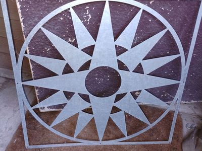 Two, 2'x2' Metal wall decor