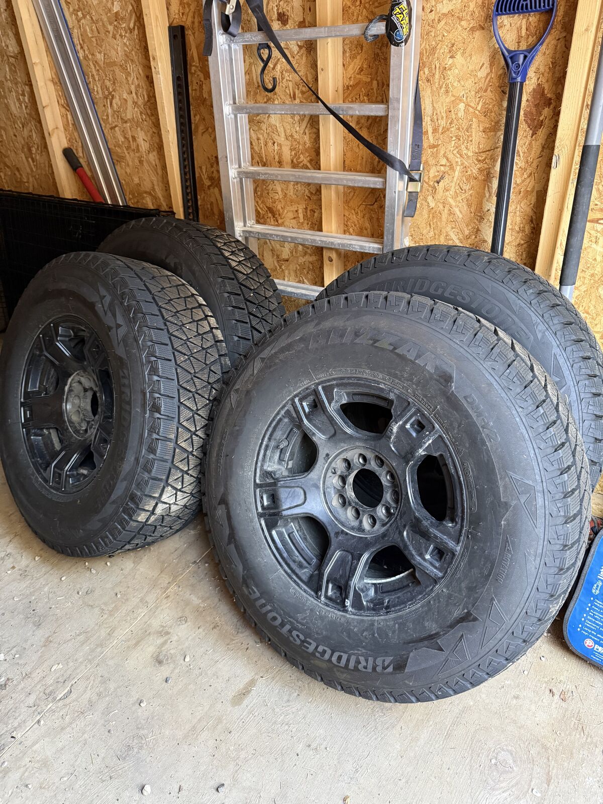 Blizzak tires on black rims 265/70r16, only 1 season of use!