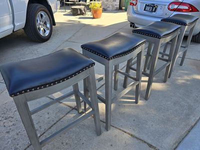 4 leather top GrandinROAD bar stools