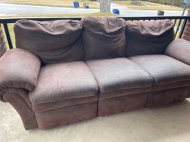 Brown couch with two recliners
