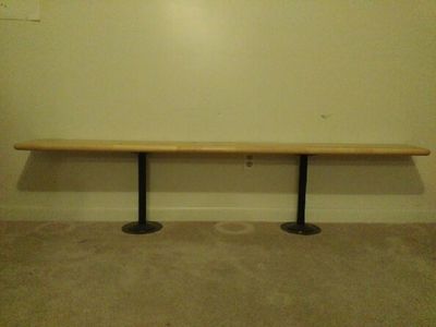 Long Wooden Benches with Two Black Metal Pedestal Bases - Versatile Furniture Piece