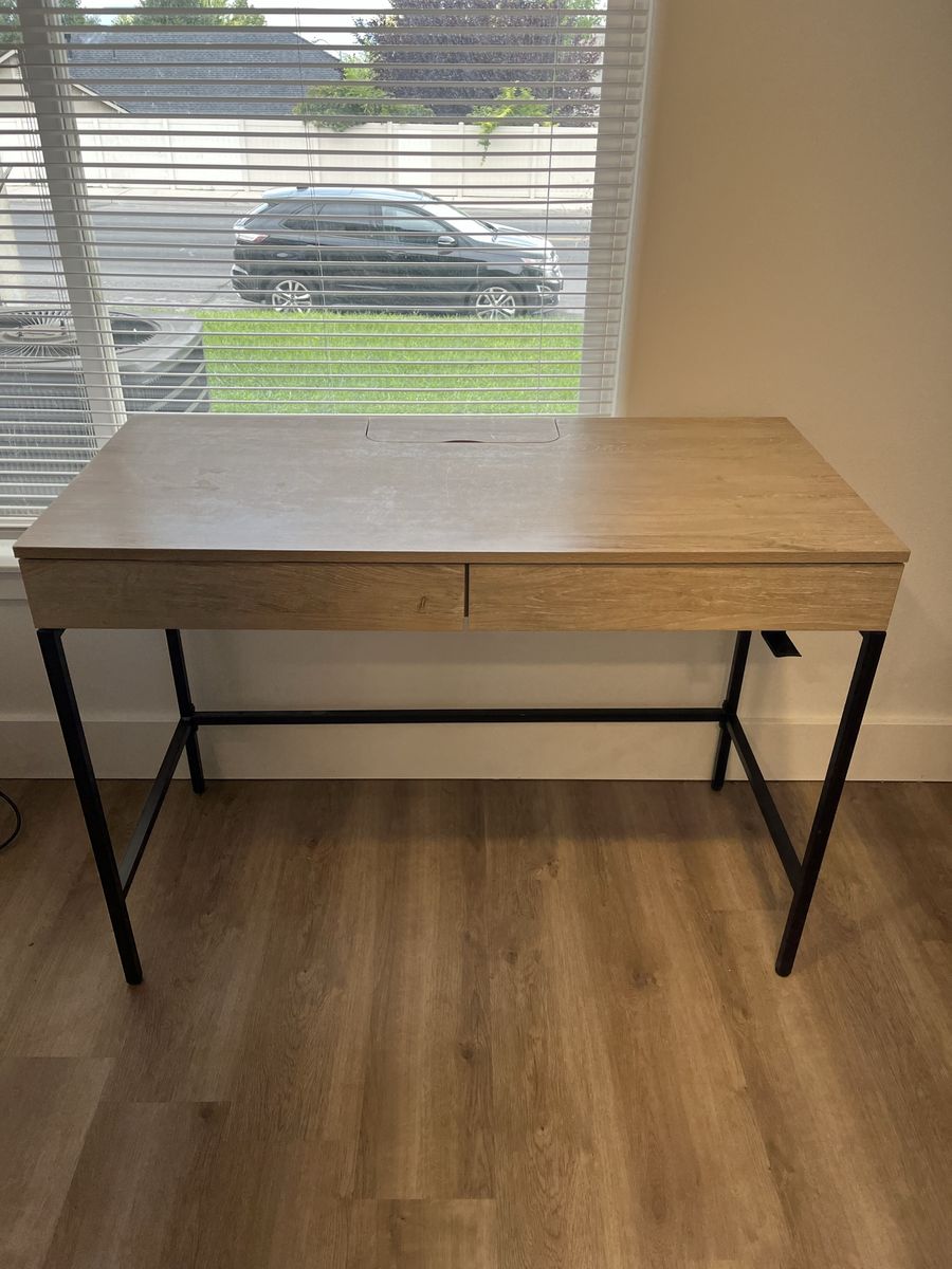 Modern Light Wood Grain Standing Desk with Dual Drawers and Black Metal Frame