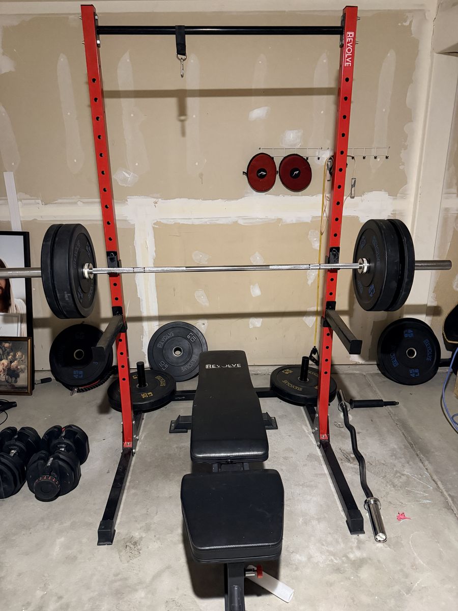 Squat rack with 300 pounds rubber bumper plates