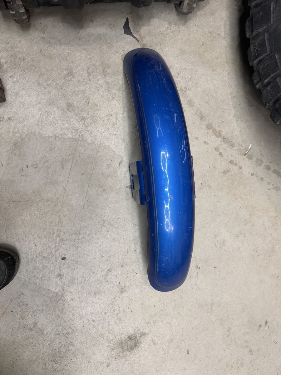 Blue Motorcycle Front Fender with Mounting Bracket and Gold Pinstriping came off 1998 Harley sporster 