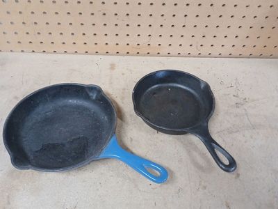 Two cast iron skillets