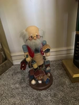 Zim's birdhouse maker Nutcracker like wooden man