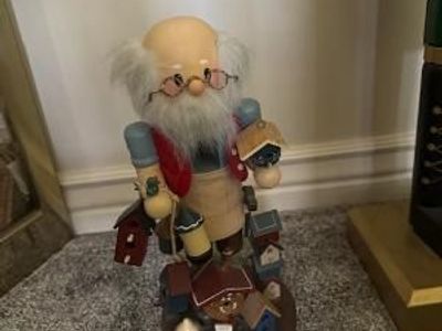 Zim's birdhouse maker Nutcracker like wooden man