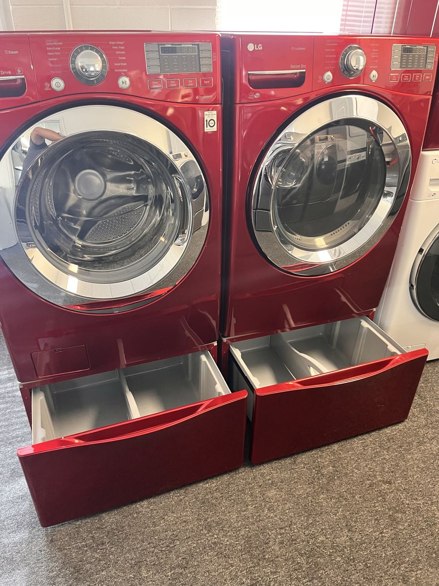 LG washer and dryer with pedestals and dry rack
