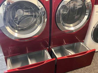 LG washer and dryer with pedestals and dry rack