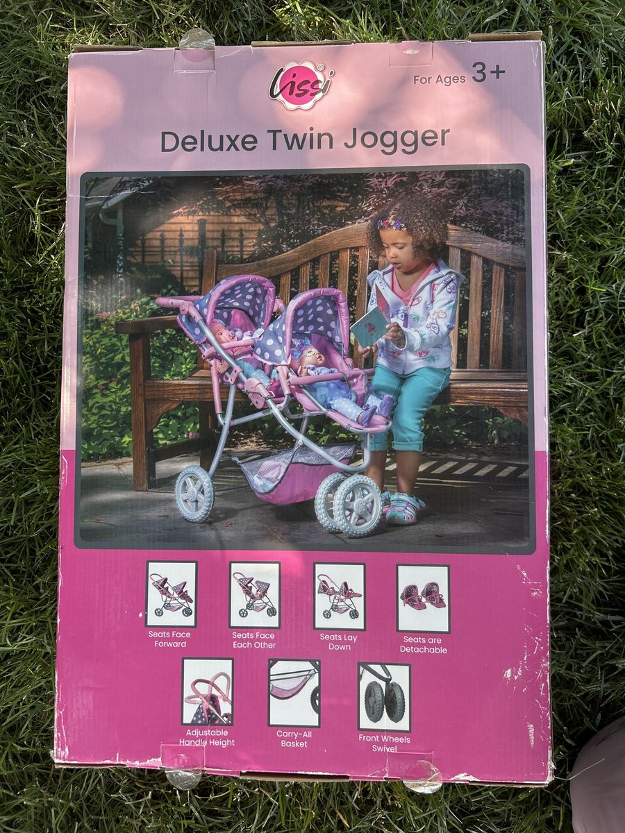 Double doll stroller new in box