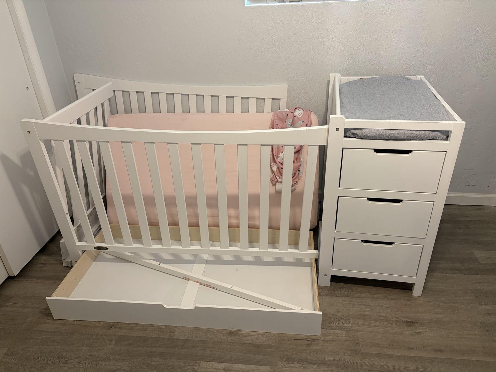 White Grace crib with attached changing table