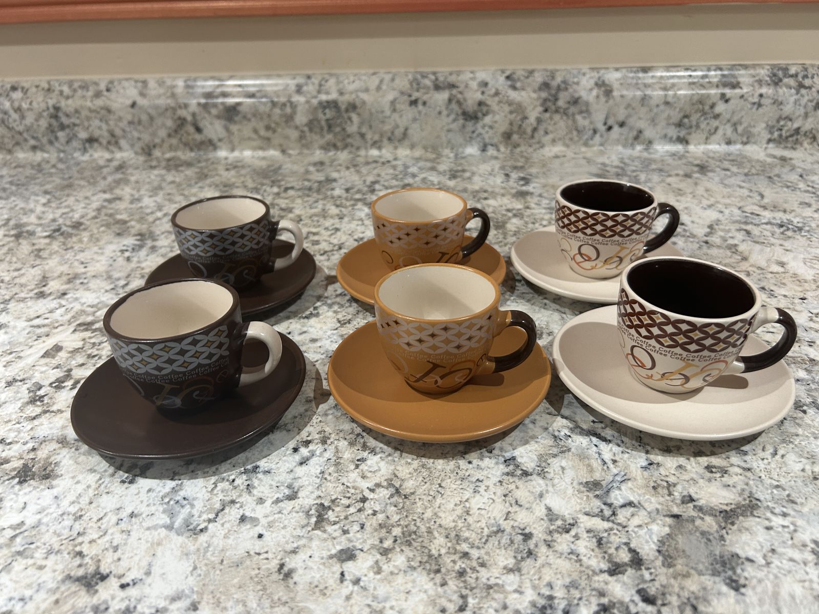 Set of 7 expresso cups/saucers