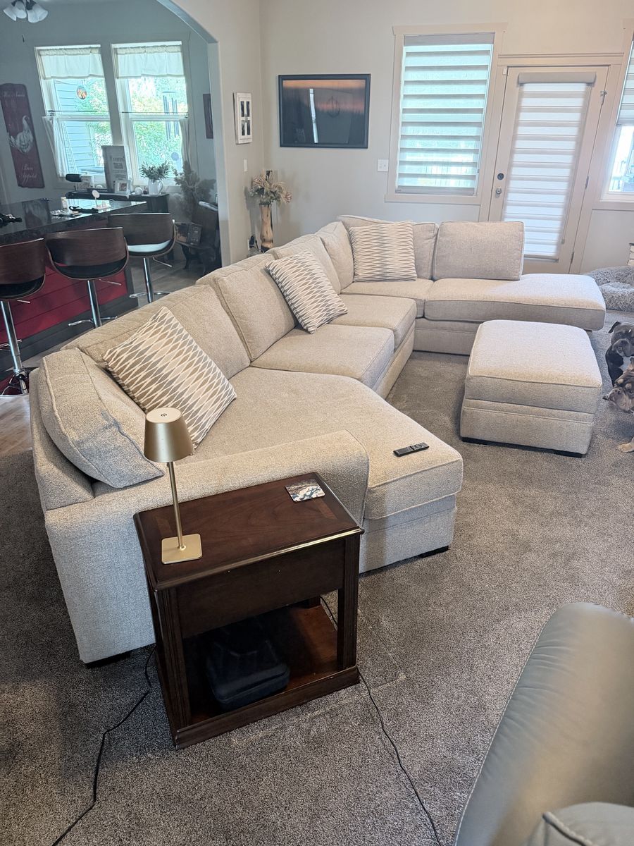 Beige U-Shaped Sectional Sofa with Storage Ottoman and Pillows 