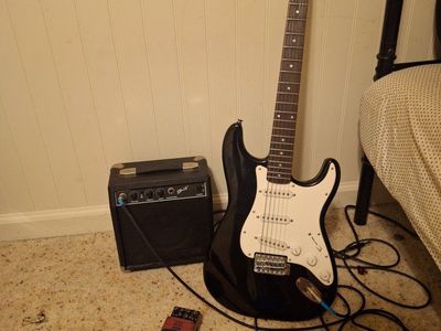 Squier Affinity Series Stratocaster Electric Guitar with SP-10 Amp and BOSS DS-1 Pedal