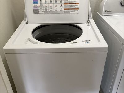 Whirlpool WTW5000DW1 Top Load Washing Machine White and Whirlpool Front Load Dryer