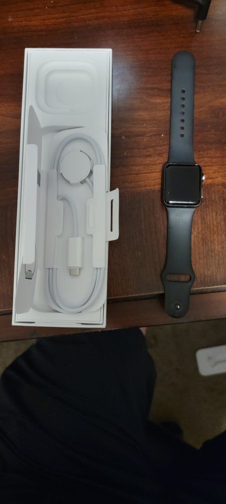 Apple Watch with Black Sport Band, Magnetic Charging Cable, and Original Box