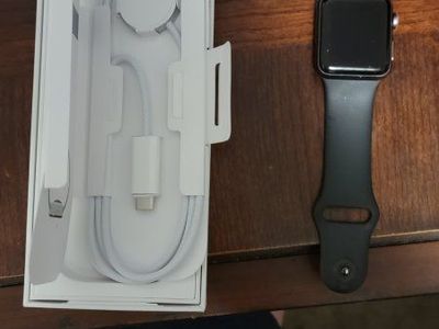 Apple Watch with Black Sport Band, Magnetic Charging Cable, and Original Box