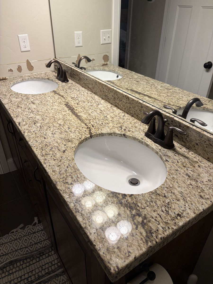 Granite Vanity with Moen Fausets