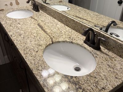 Granite Vanity with Moen Fausets
