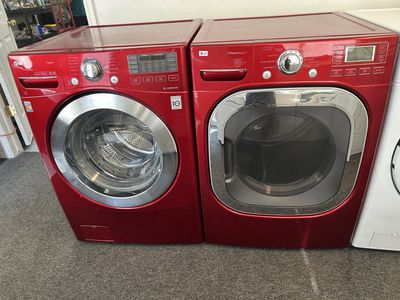 Red LG washer and electric dryer