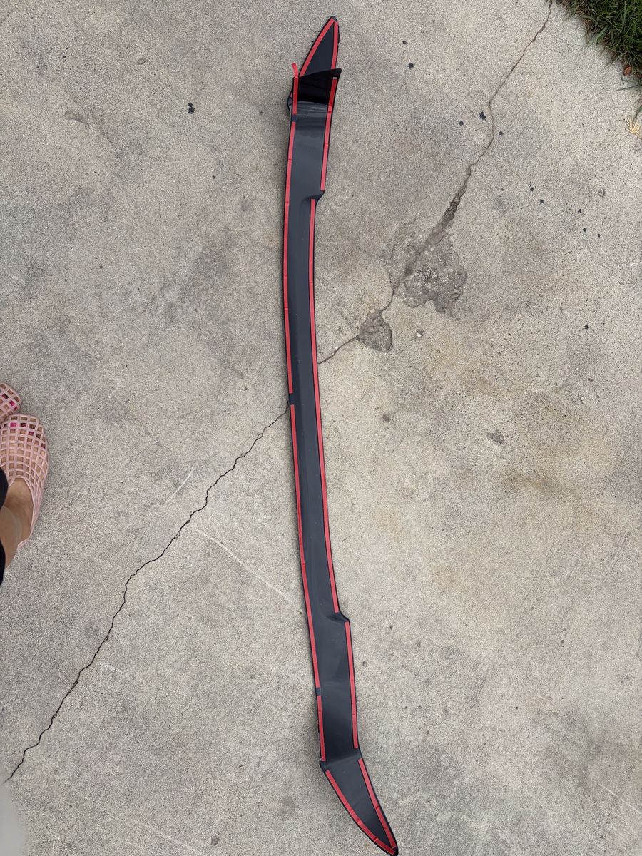 Automotive Trim Molding Piece with Adhesive Backing