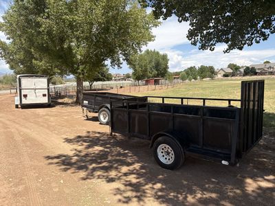 10' Utility trailer with ramp and deep sides. Good tires and a spare.