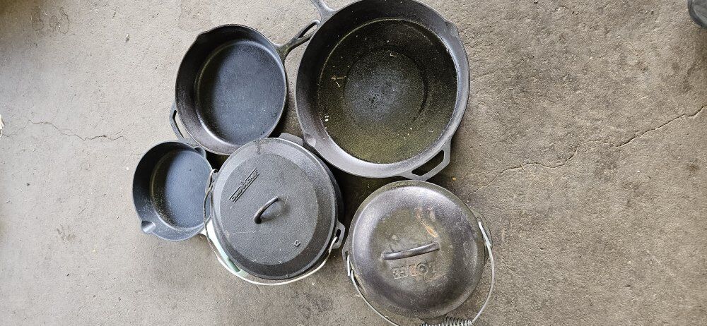 Assortment of cast iron cookware.