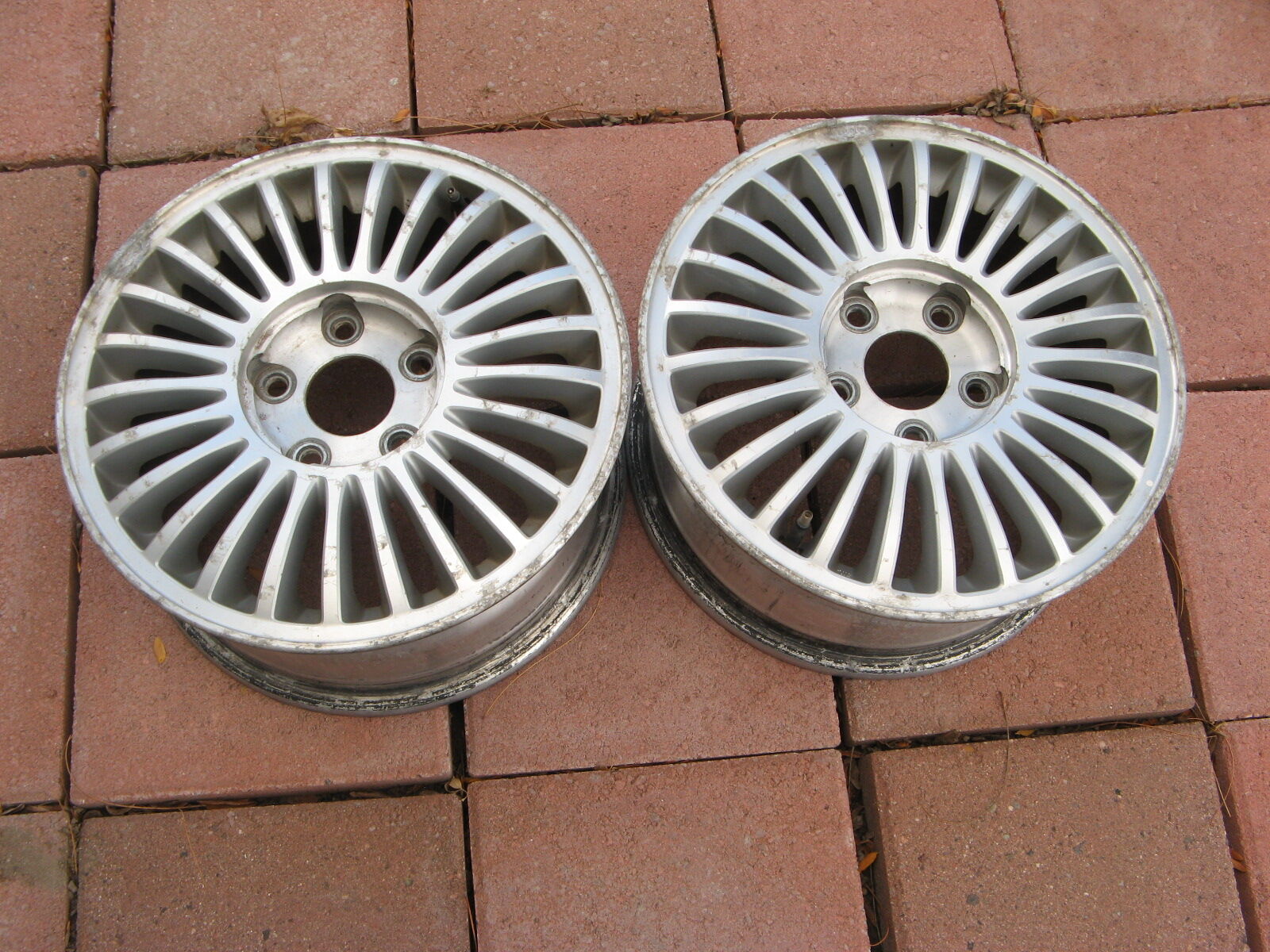 2- Wheels for a Nissan Infinity 4 door sedan. Good for Snow Tires.