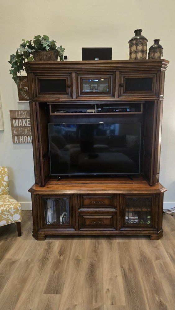 large solid wood entertainment center