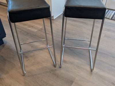 2 Black Faux Leather & Chrome Saddle Stools - Modern Bar Height Seating
