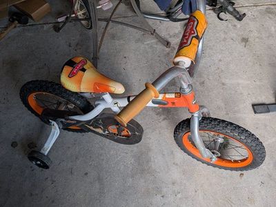 huffy kids bike from the movie "planes" BMX with training wheels.