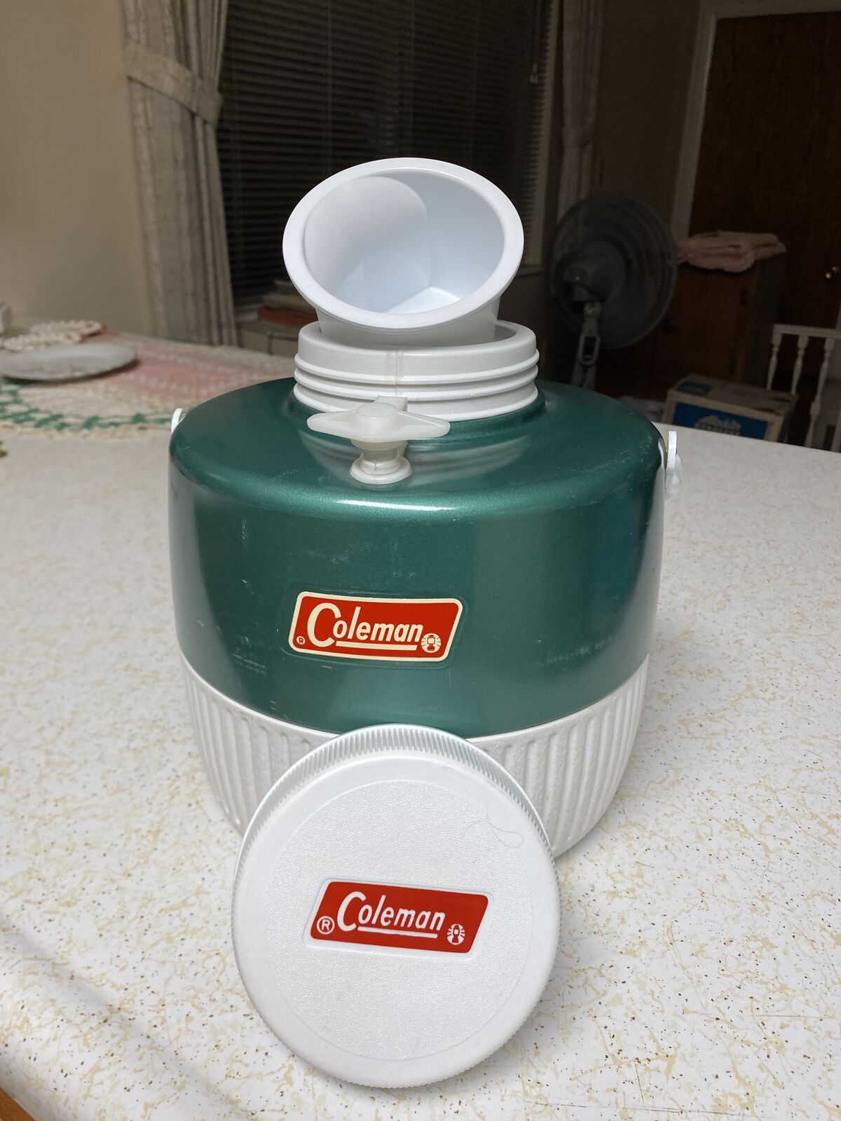 Green Coleman 1 Gallon jug with cup