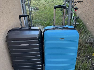 Samsonite and Rockland hard shell luggages 29” Tal