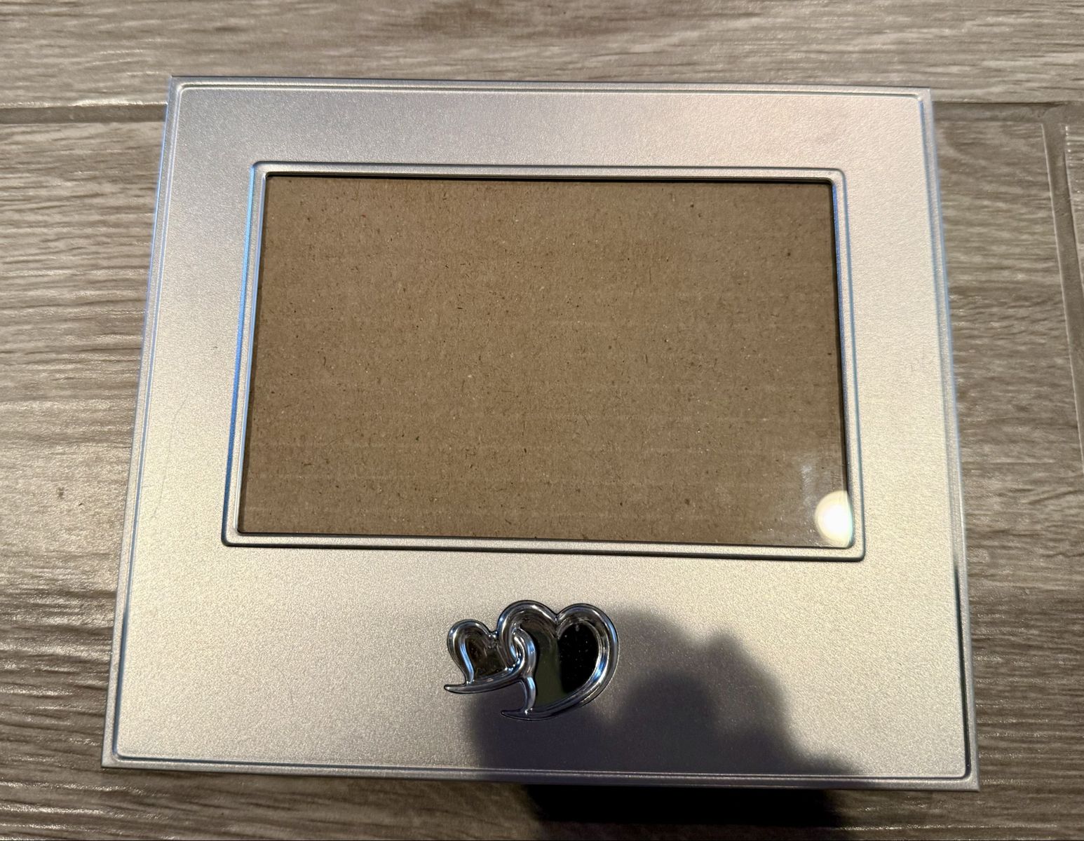 Silver-Tone Metal Photo Frame with Interlocking Hearts Detail