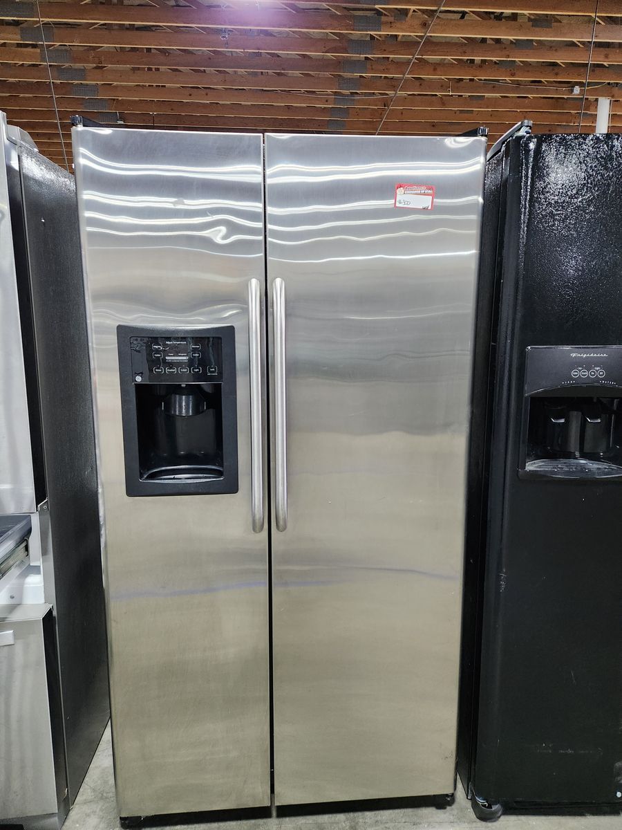 Low Price Guaranteed! GE side by side stainless steel fridge! w-warranty