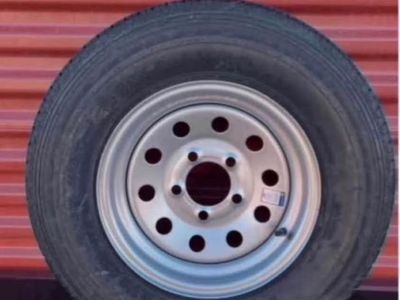 New Free Country Spare Tire ST 205/75 D 15” Hard to find 5 on 5 lug Pattern Silver Wheel I only have 1