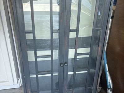 Black Wooden Display Cabinet with Glass Doors and Adjustable Shelves