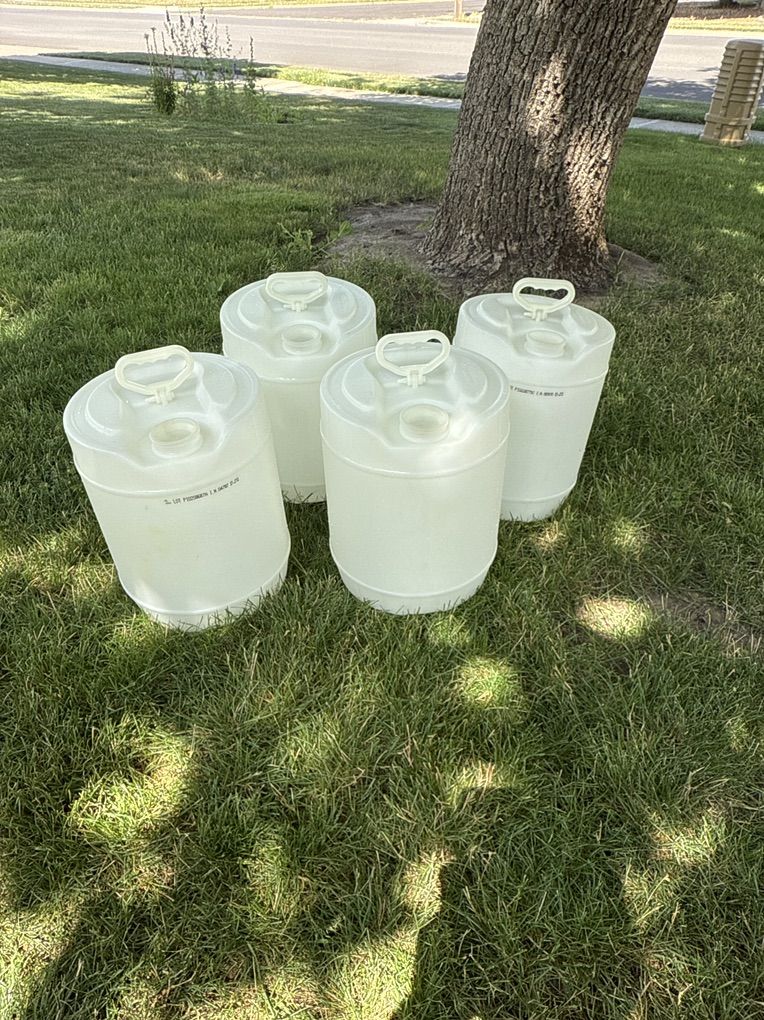 Set Of 4  Very Clean 5 Gallon Water Containers