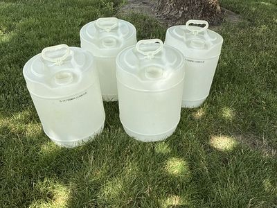Set Of 4 Very Clean 5 Gallon Water Containers