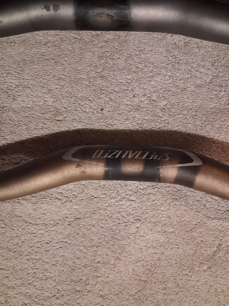 Specialized brand bicycle riser handlebar