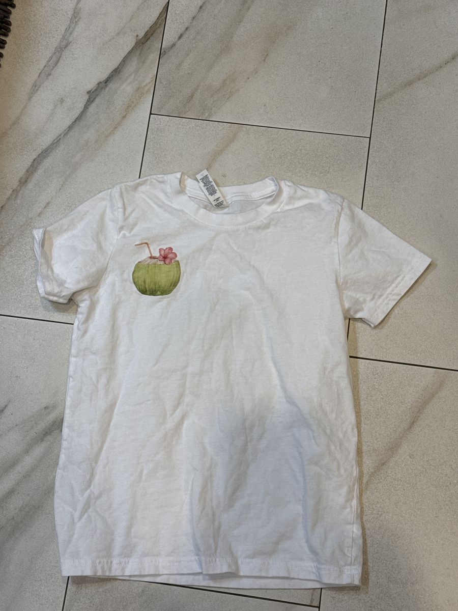 Size 10–12 T-Shirt.