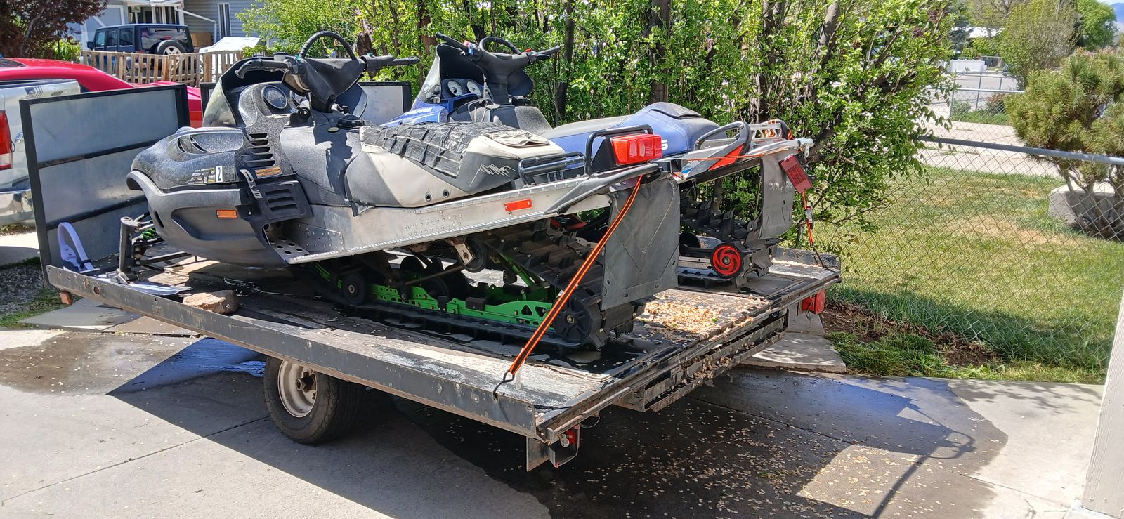 For sale two snowmobiles and the trailer