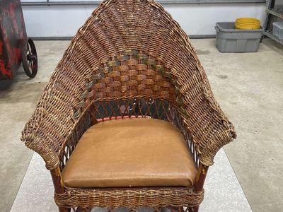 Antique Beautiful Childs wicker rocking chair. Unique and valuable.
