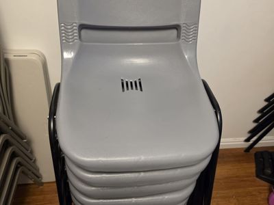 Two Types Of Stacked Chairs