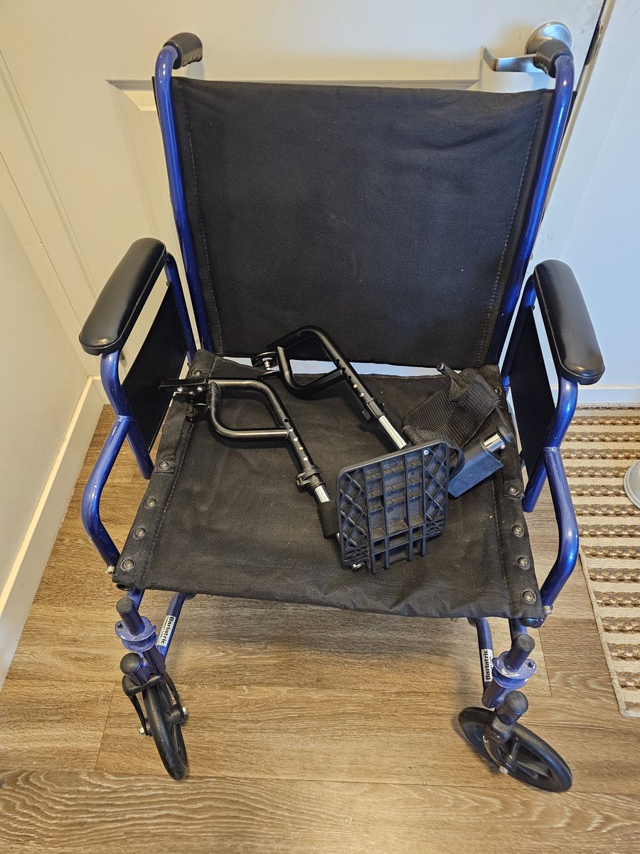 Transport wheelchair 