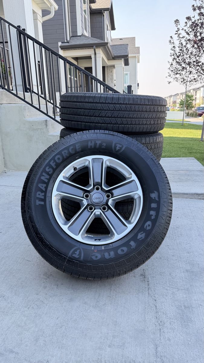 Jeep Wrangler Rims and Tires 275/70R18 Firestone Transforce HT2