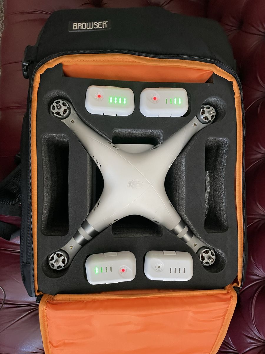 (For parts or repair) DJI Phantom 3 Advanced Drone Bundle with Camera, Batteries & Browser Carrying Case.