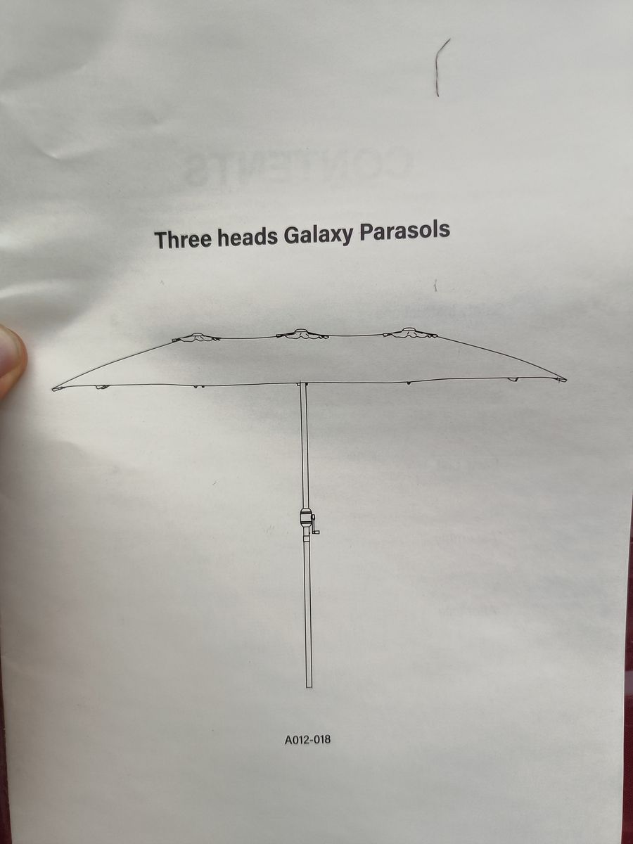 10 or 12 foot wide outdoor umbrella New, no base