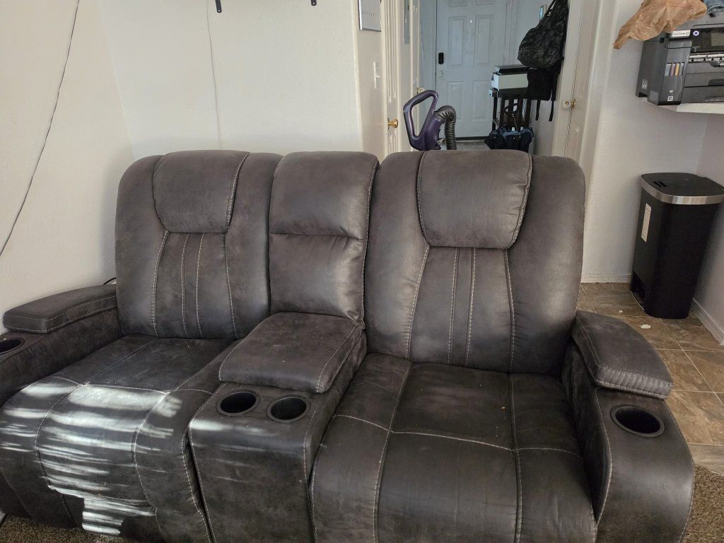 loveseat and sofa all four recline loveseat has a pull down table and it has a power bar to plug stuff into also has a light