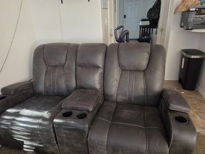 loveseat and sofa all four recline loveseat has a pull down table and it has a power bar to plug stuff into also has a light
